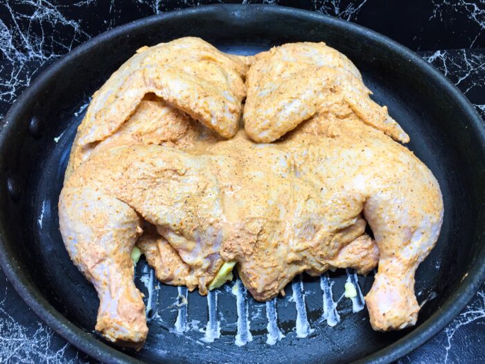 Place the chicken in the pan