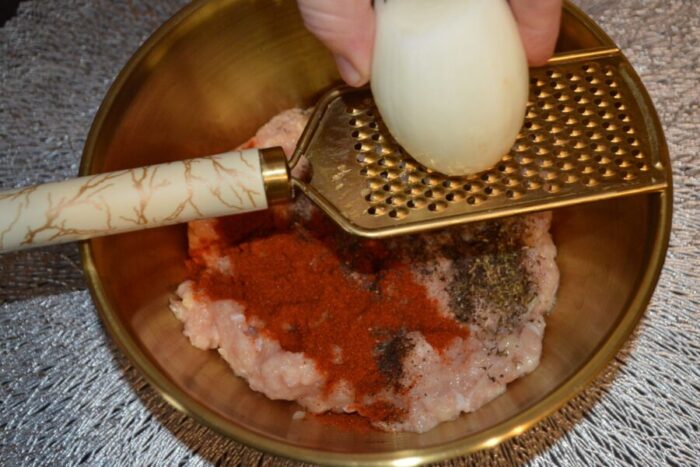 Finely grate the onion