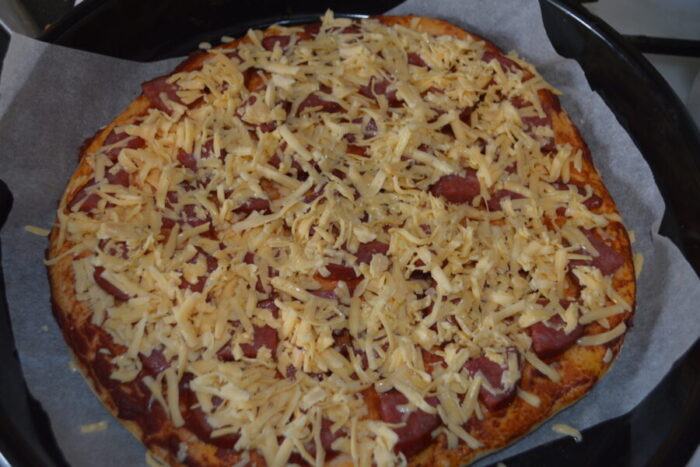 Volver a meter la pizza en el horno