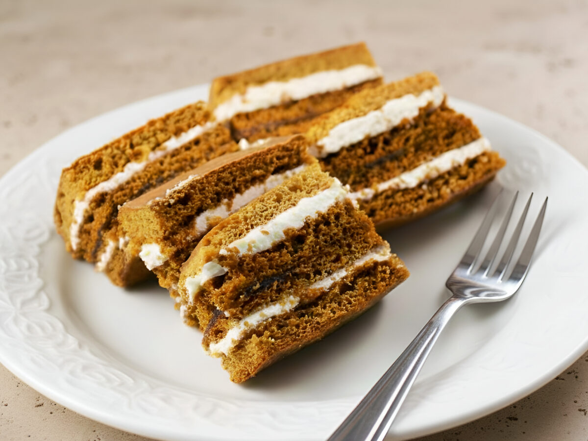 Honey cake with caramel cream photo